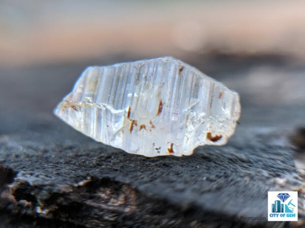 Ceylon Natural Colourless Sapphire Terminated Crystal ( Shinny Glass Body with growth marks ) - city of gem Ratnapura