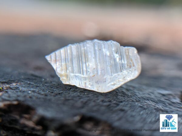 Ceylon Natural Colourless Sapphire Terminated Crystal ( Shinny Glass Body with growth marks ) - city of gem Ratnapura