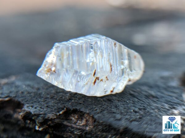 Ceylon Natural Colourless Sapphire Terminated Crystal ( Shinny Glass Body with growth marks ) - city of gem Ratnapura