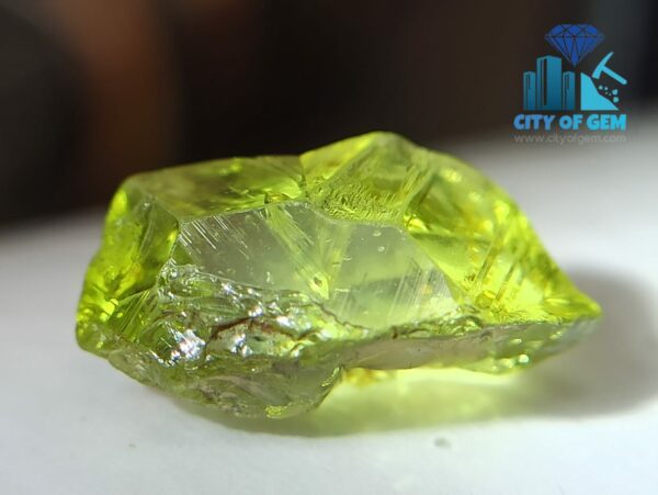 Excellent Transparent Rare Natural Chrysoberyl Apple Green Half Petal Crystal with naturally formed growth marks - city of gem ratnapura