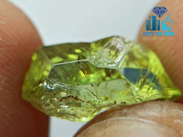 Excellent Transparent Rare Natural Chrysoberyl Apple Green Half Petal Crystal with naturally formed growth marks - city of gem ratnapura